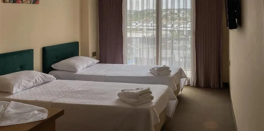 Bed in Aliento Hotel