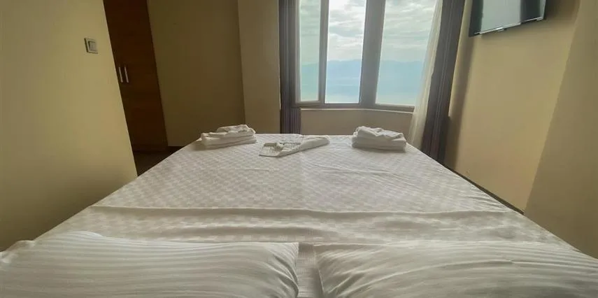 Bed in Aliento Hotel