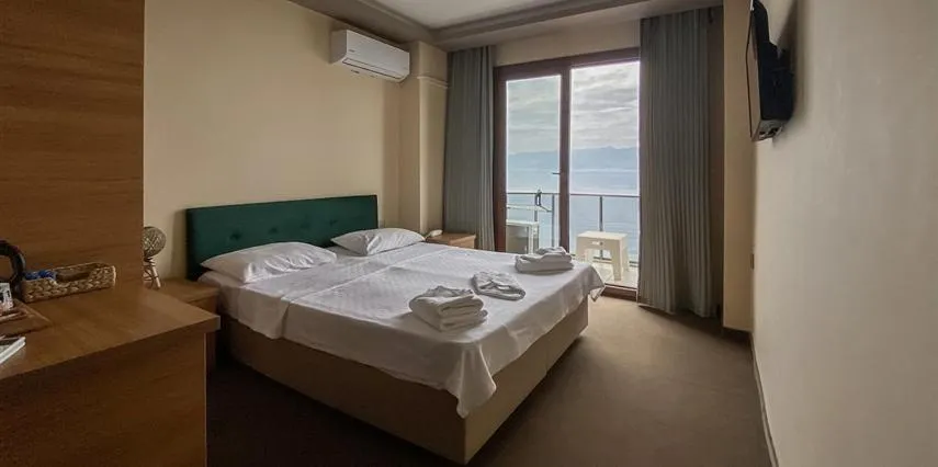 Bed in Aliento Hotel