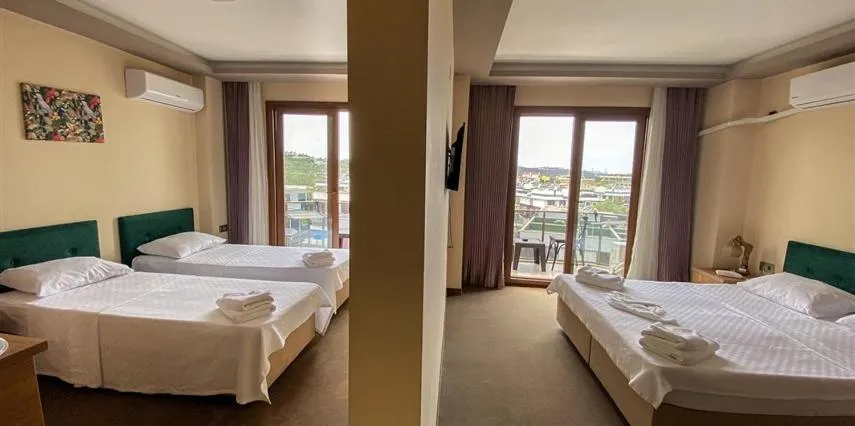 Bed in Aliento Hotel