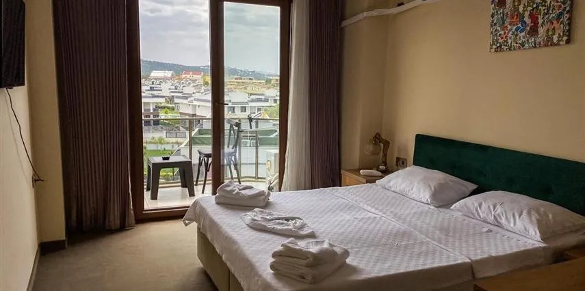 Bed in Aliento Hotel