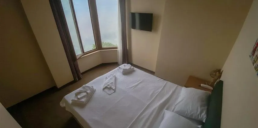 Bed in Aliento Hotel