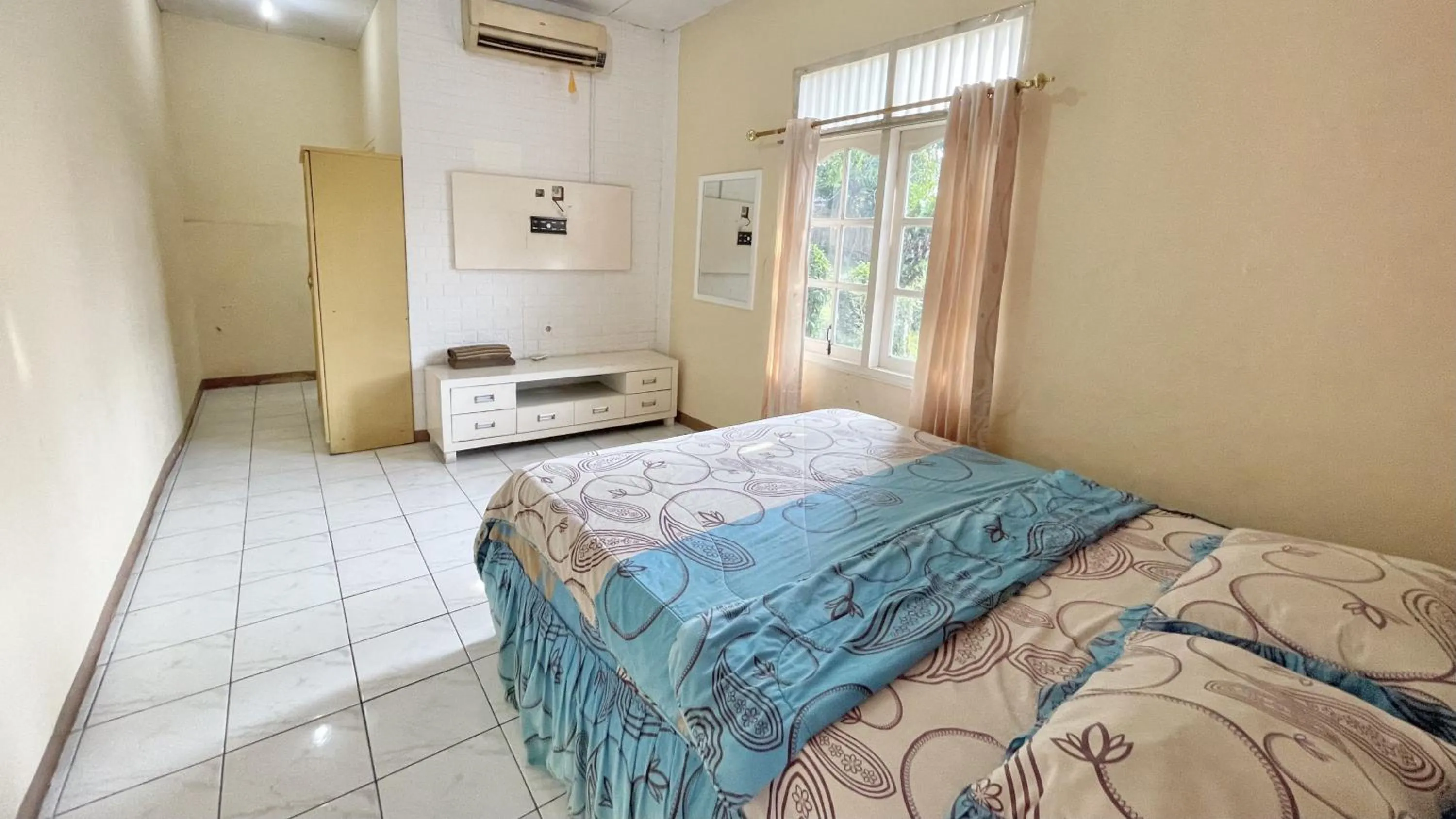 Bed in The Kanzi Hotel & Village