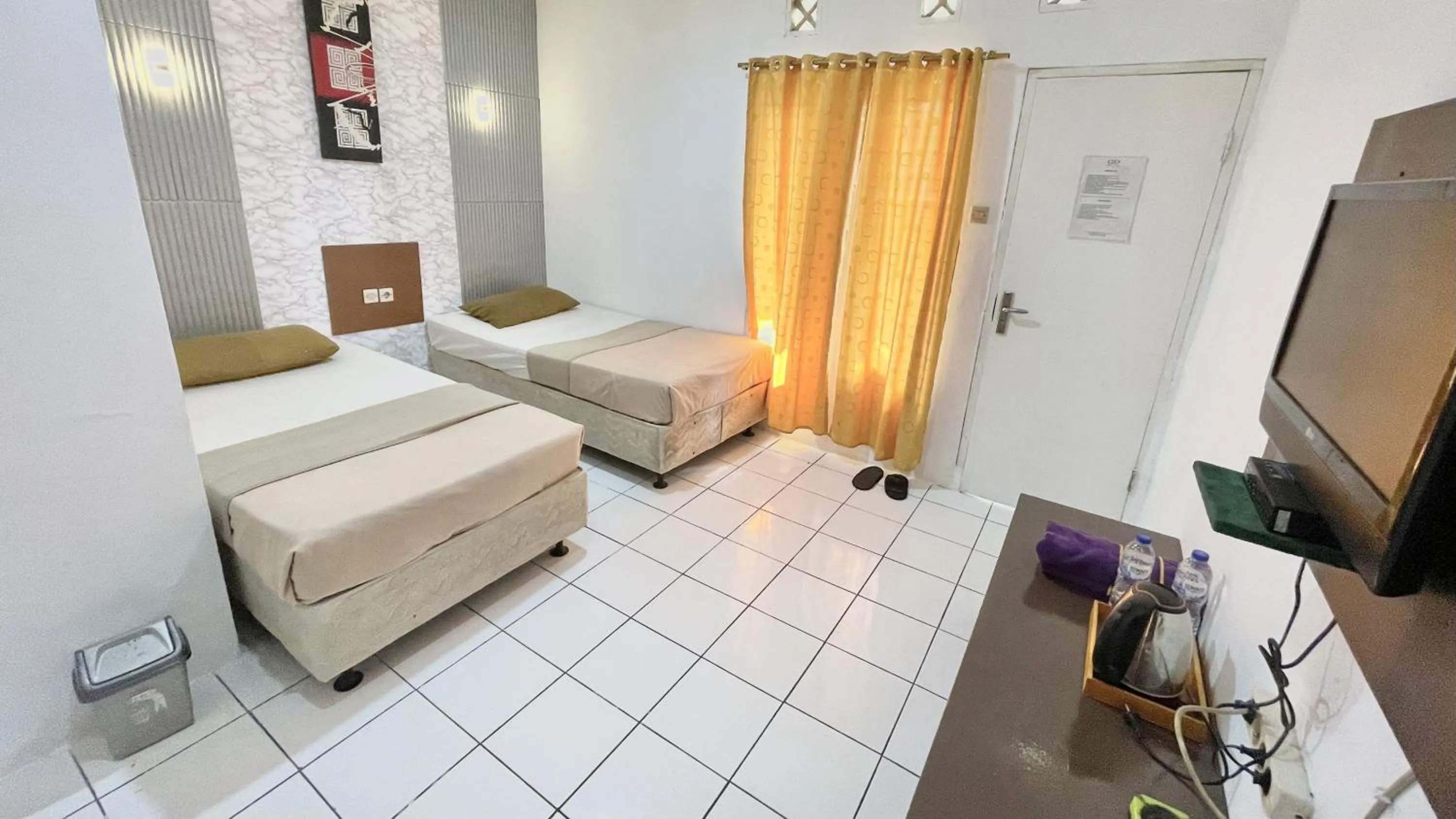 Bed in The Kanzi Hotel & Village