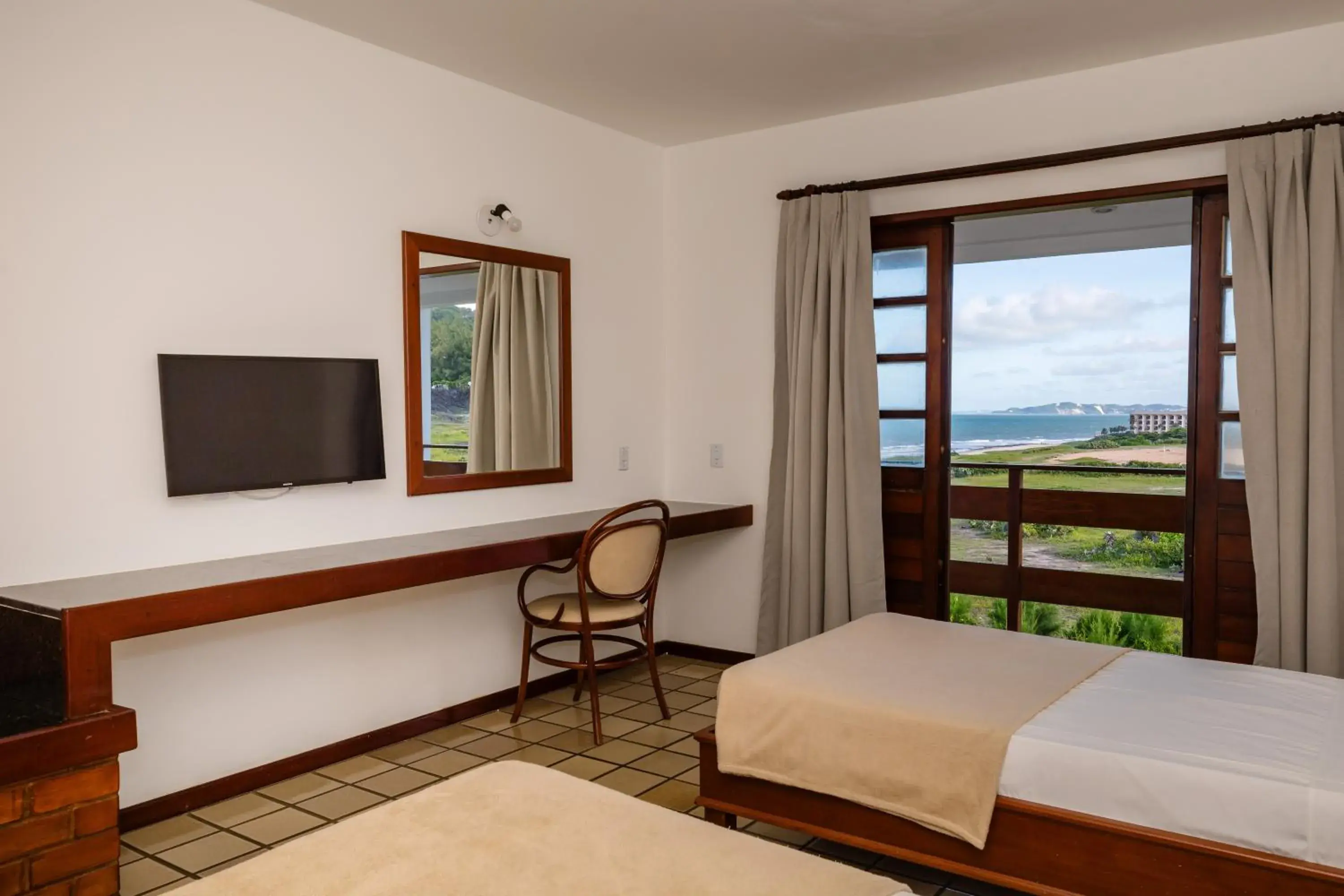 Bed in Mirai Beach Hotel Bed in Mirai Beach Hotel