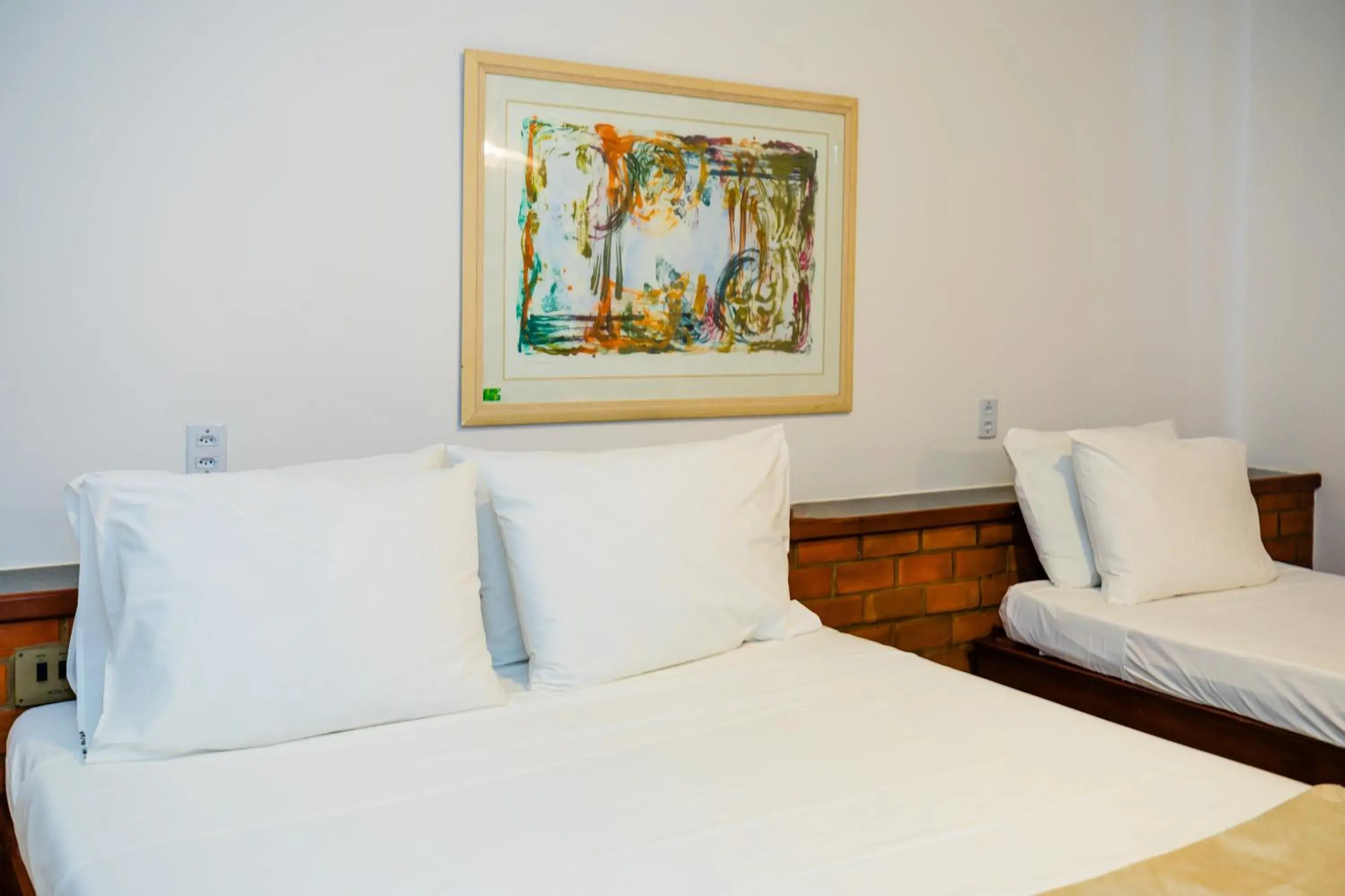 Bed in Mirai Beach Hotel Bed in Mirai Beach Hotel