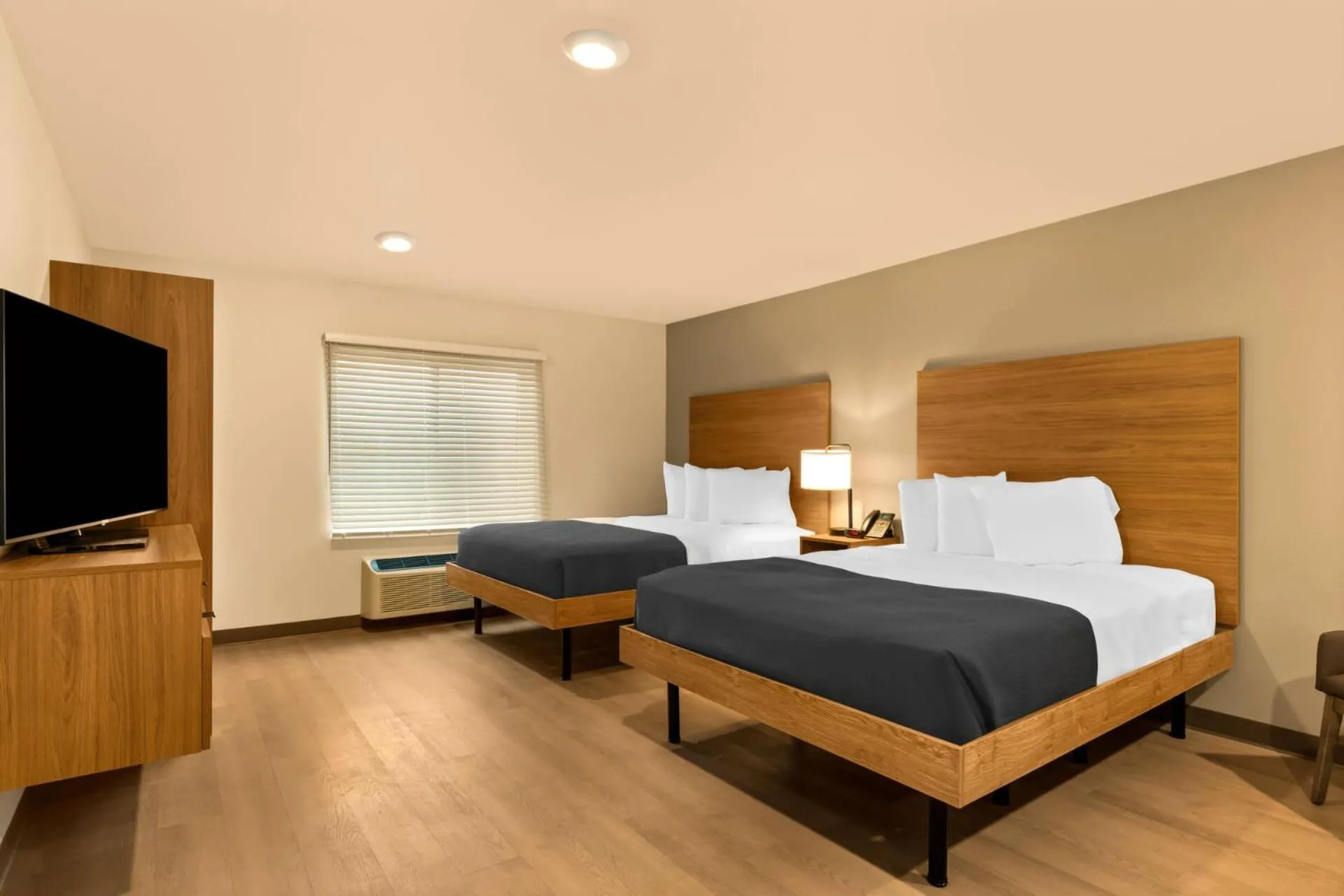 Bedroom, Bed in LivAway Suites Tri-Cities-Richland