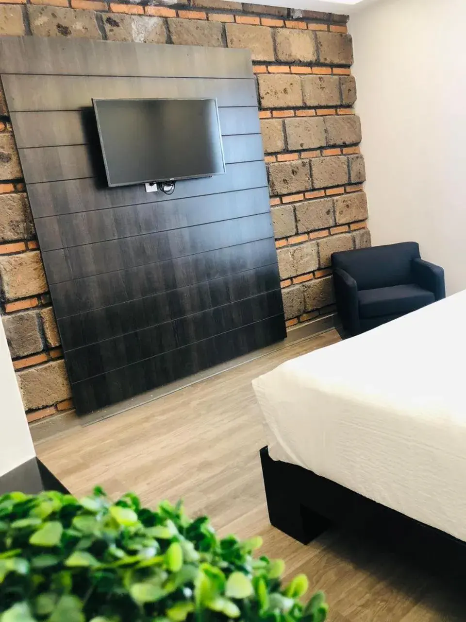 TV and multimedia, Bed in QA Hotel TV and multimedia, Bed in QA Hotel