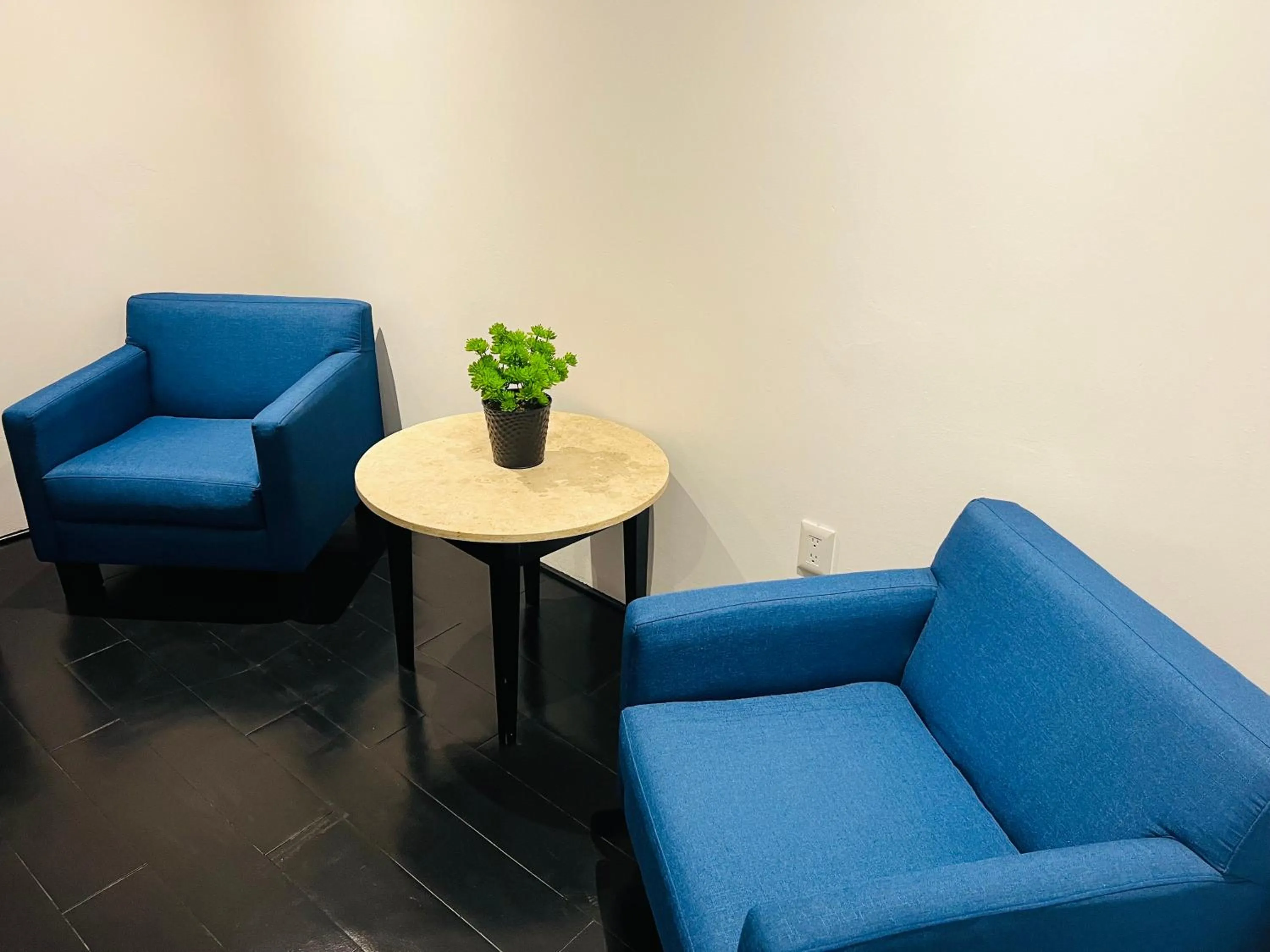 Seating area in QA Hotel