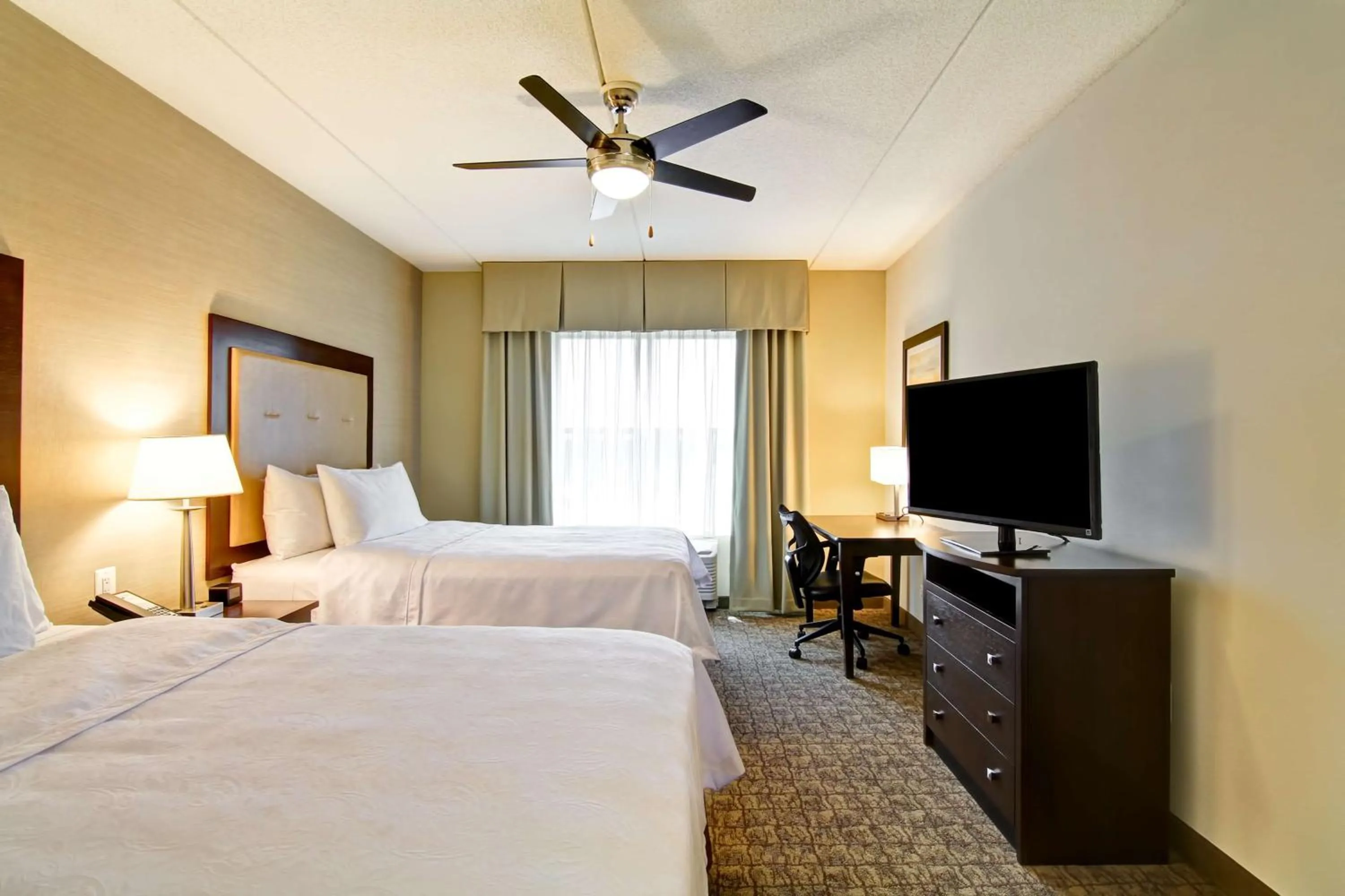 Bed in Homewood Suites by Hilton Woodbridge