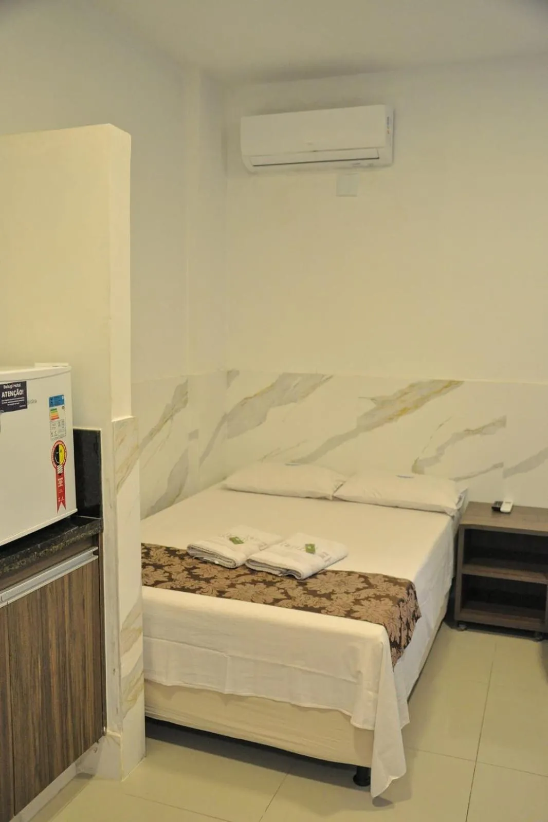 Bed in Hotel Belugi