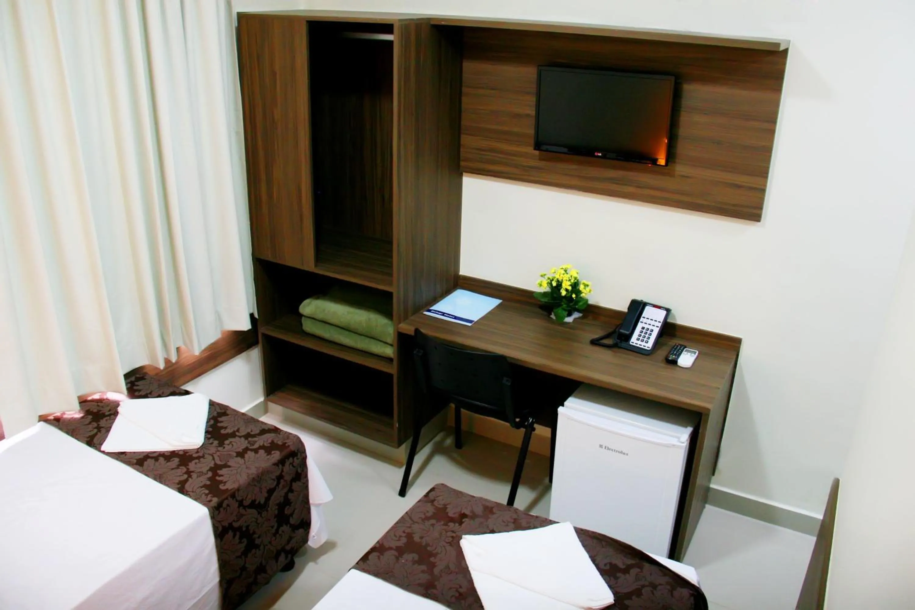 Seating area, Bed in Hotel Belugi