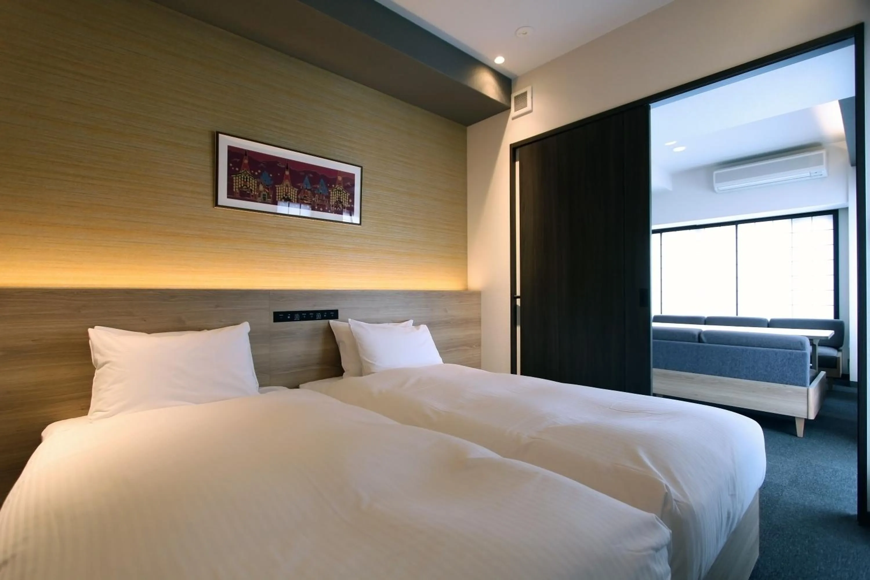 Bed in KOKO HOTEL Residence Kyoto Nijo Castle