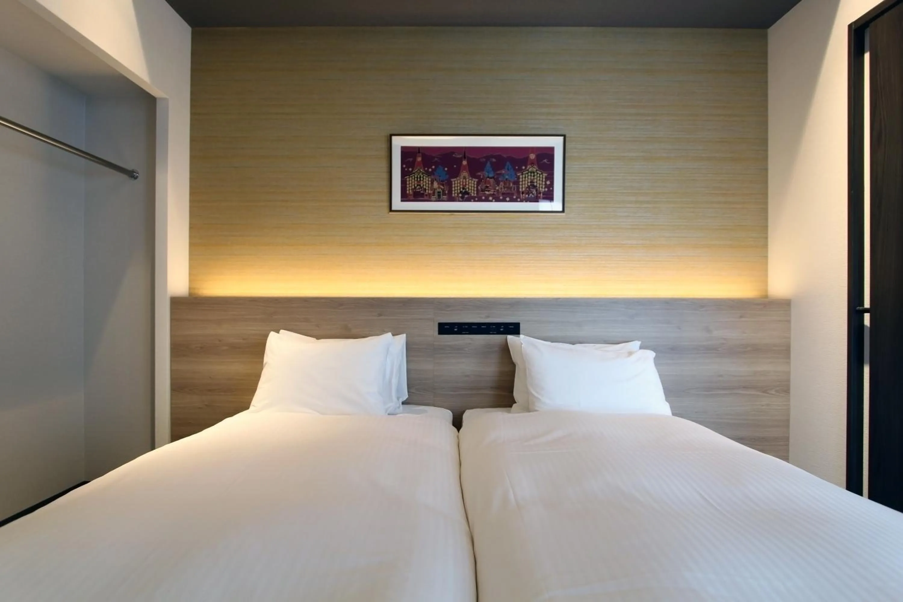 Bed in KOKO HOTEL Residence Kyoto Nijo Castle