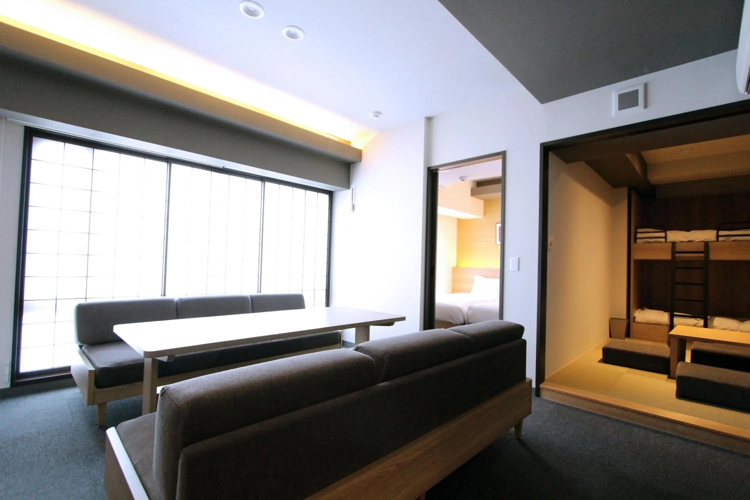 Photo of the whole room, Bed in KOKO HOTEL Residence Kyoto Nijo Castle