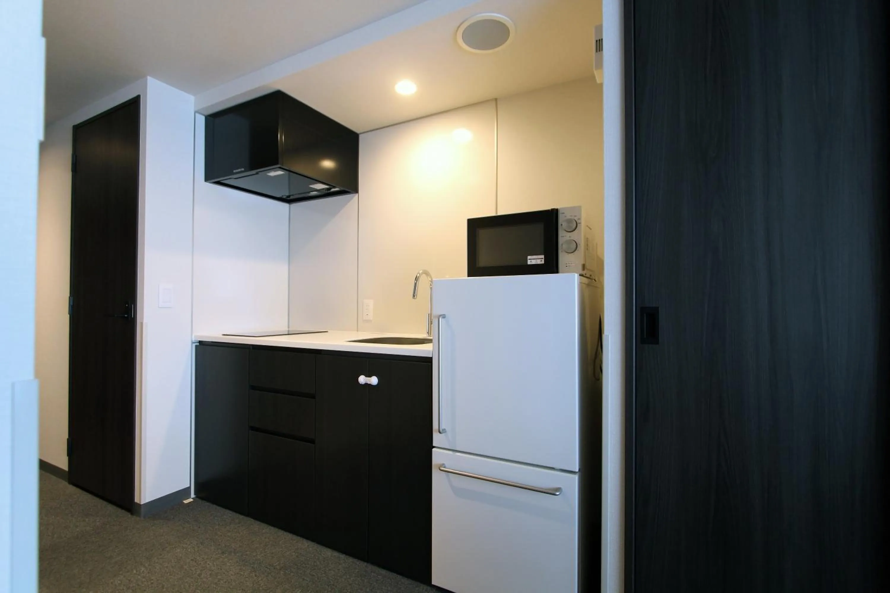 Kitchen or kitchenette in KOKO HOTEL Residence Kyoto Nijo Castle