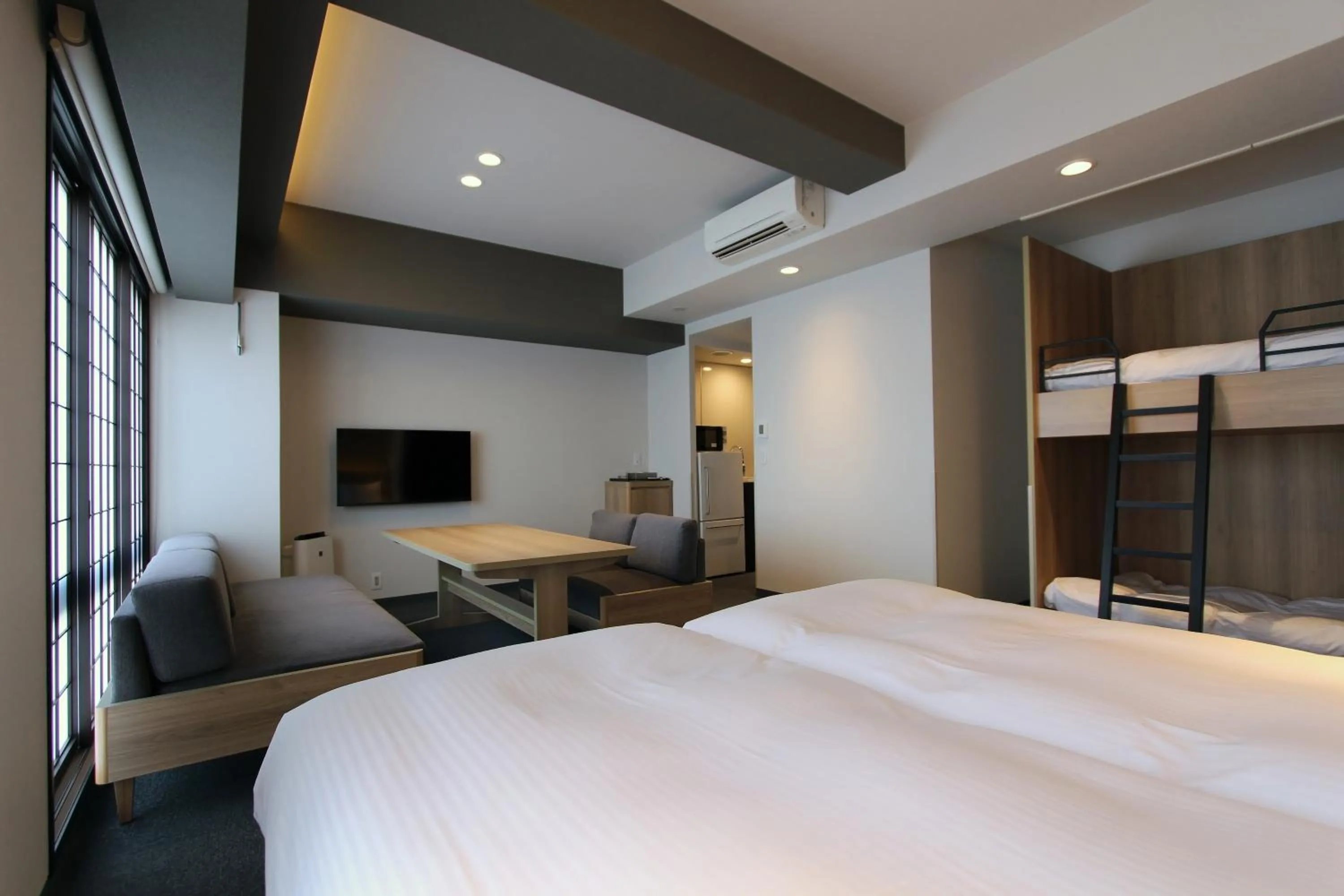 Photo of the whole room, Bed in KOKO HOTEL Residence Kyoto Nijo Castle