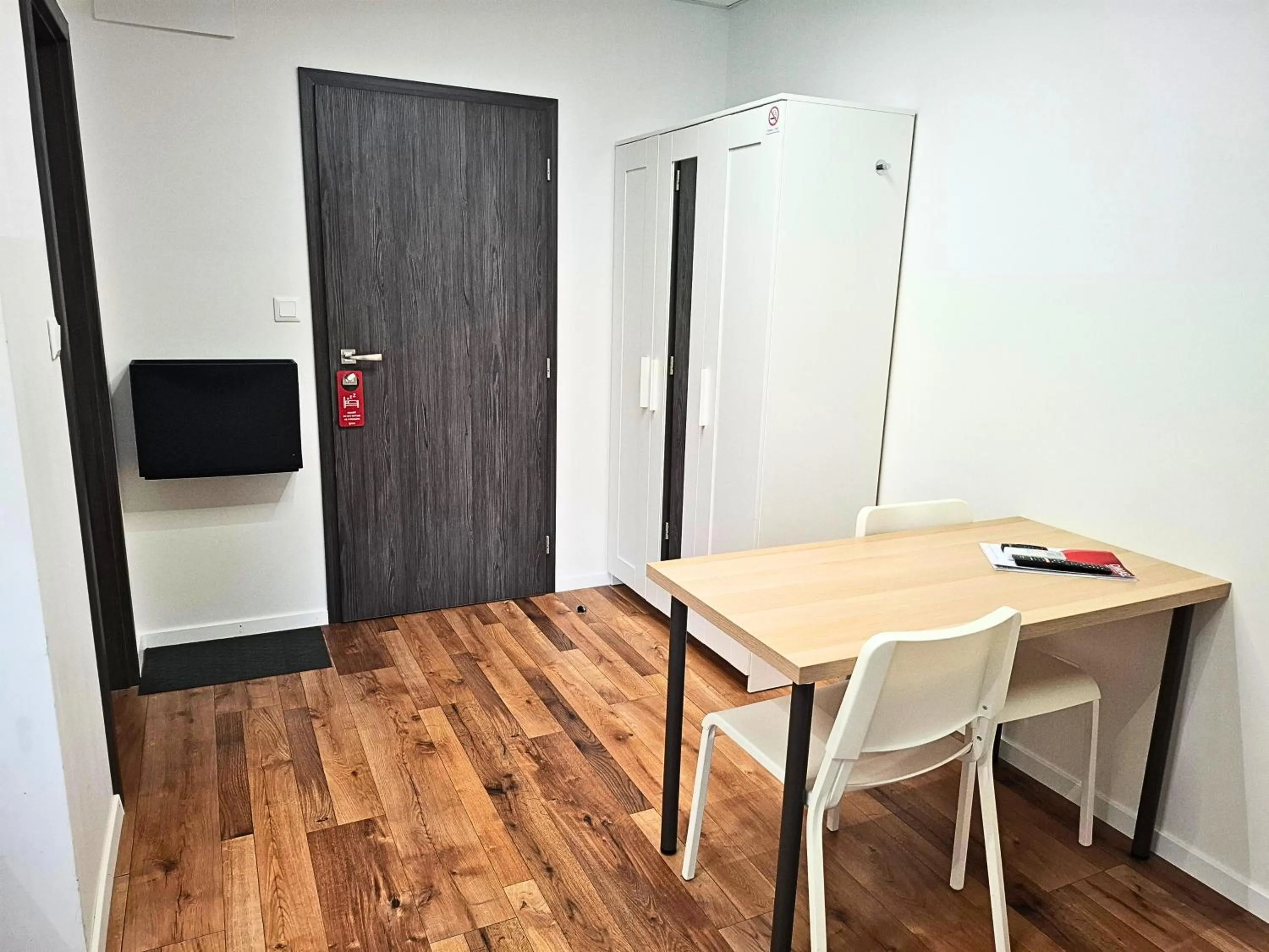 wardrobe in Dimael Hostel & Apartments