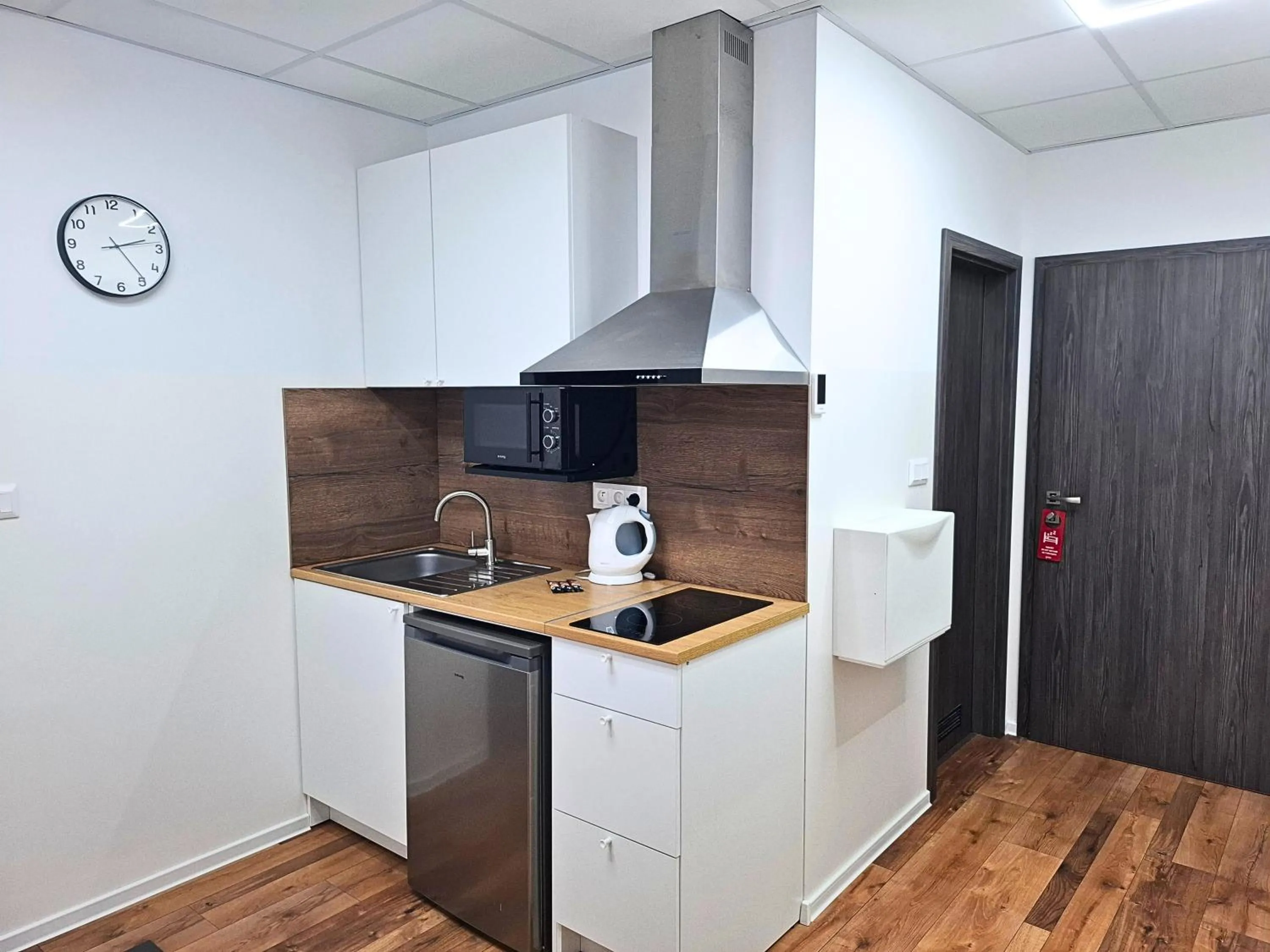 kitchen in Dimael Hostel & Apartments