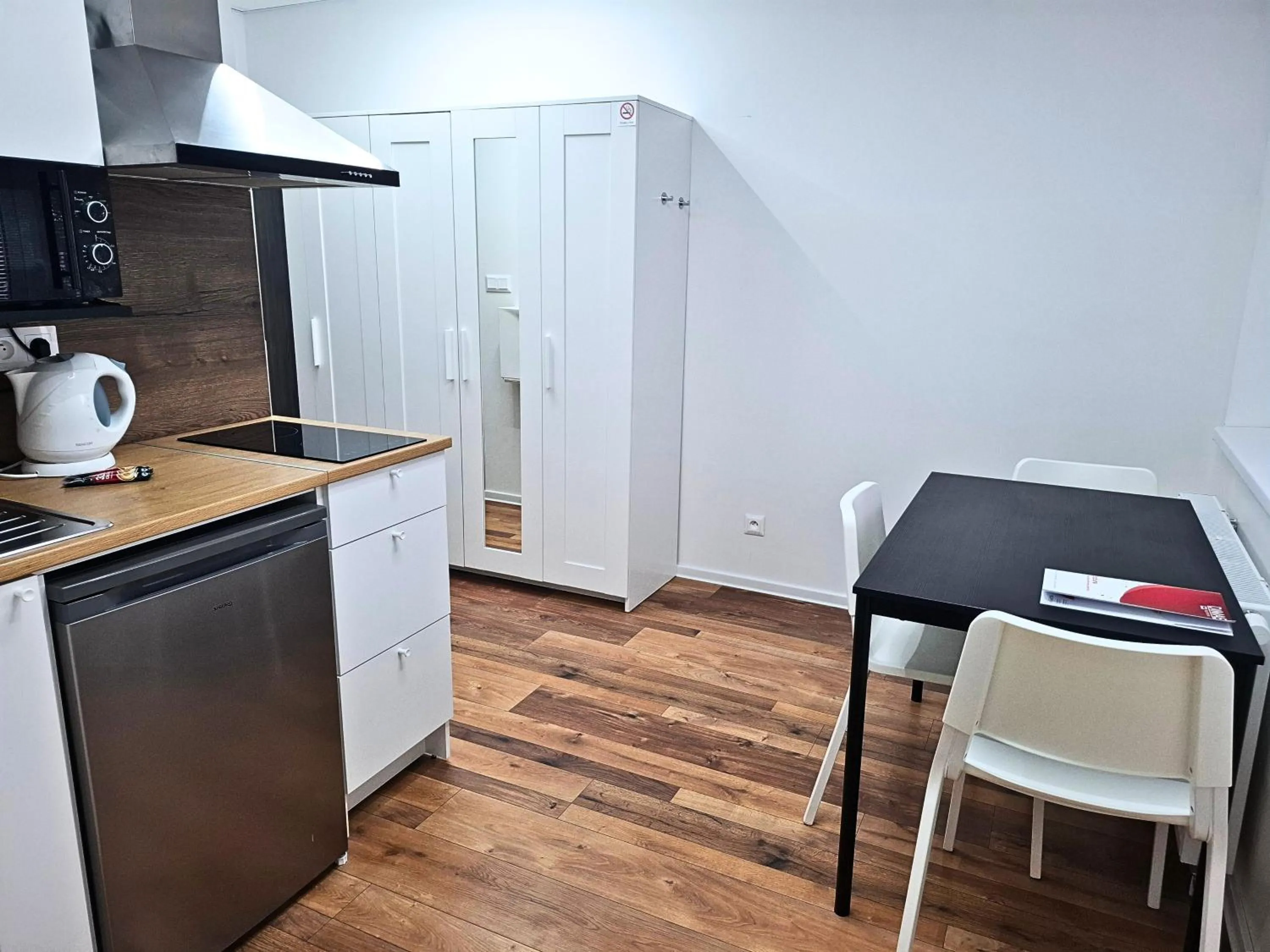 stove in Dimael Hostel & Apartments