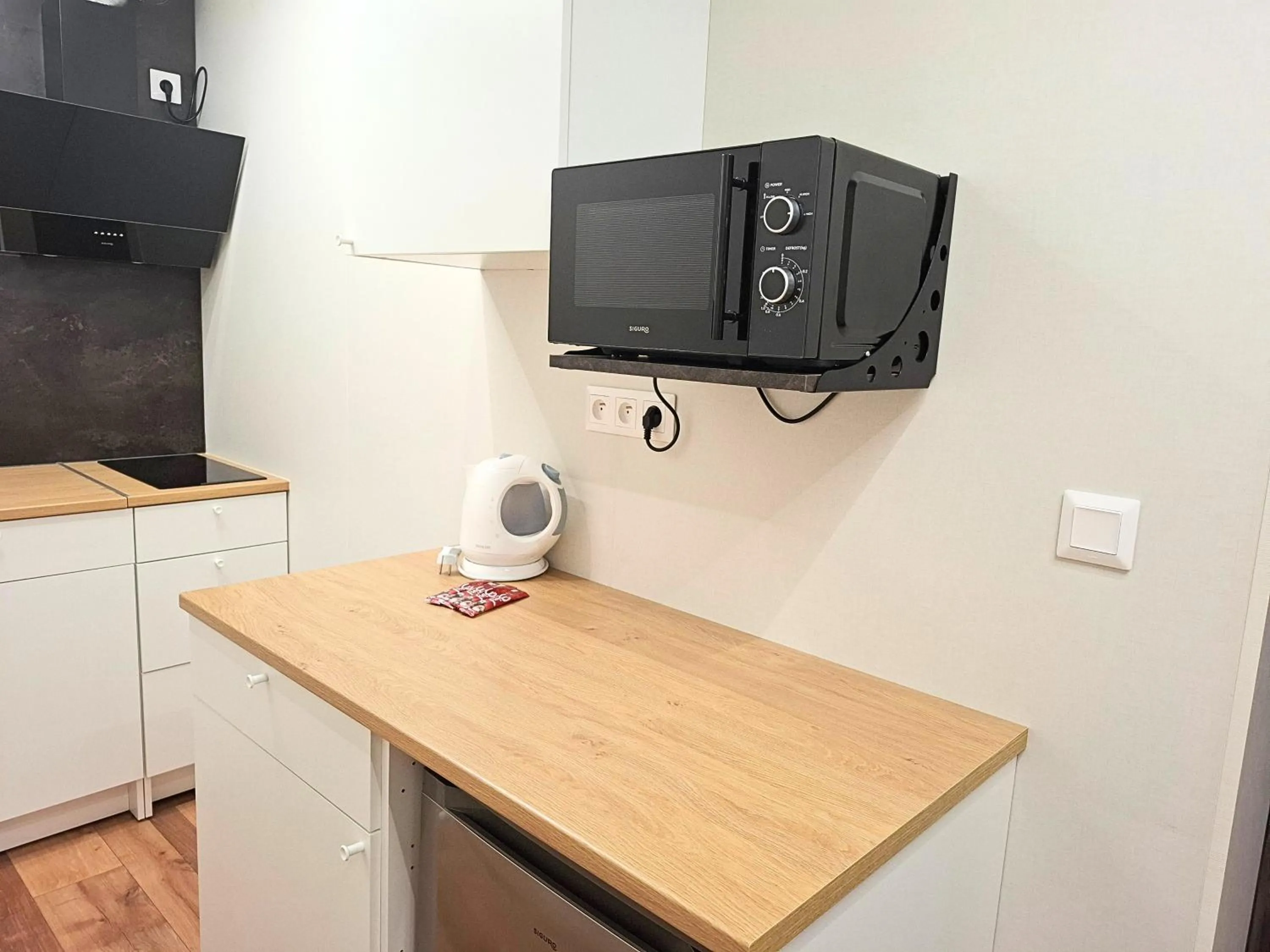 stove in Dimael Hostel & Apartments