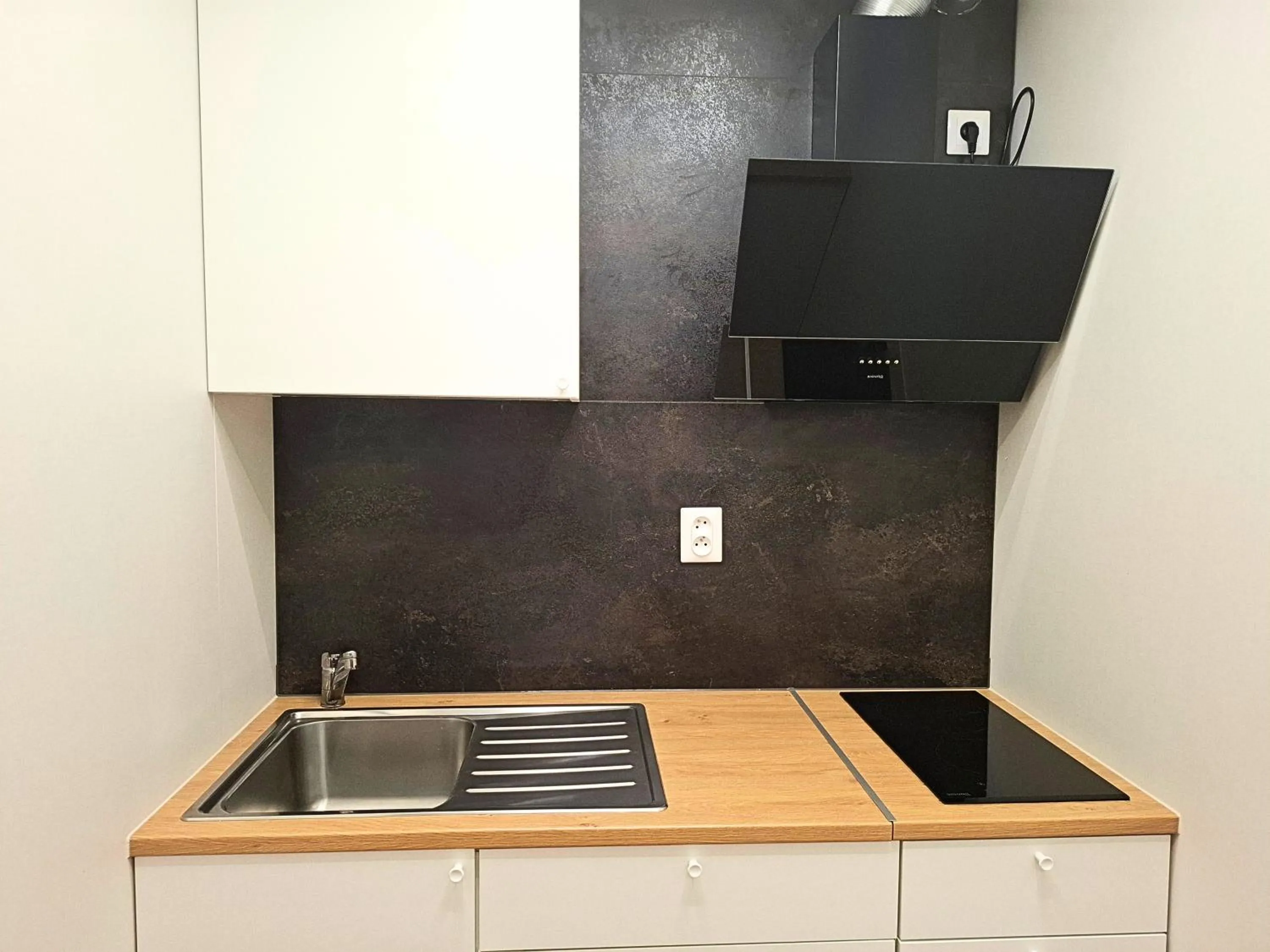 Kitchen or kitchenette in Dimael Hostel & Apartments