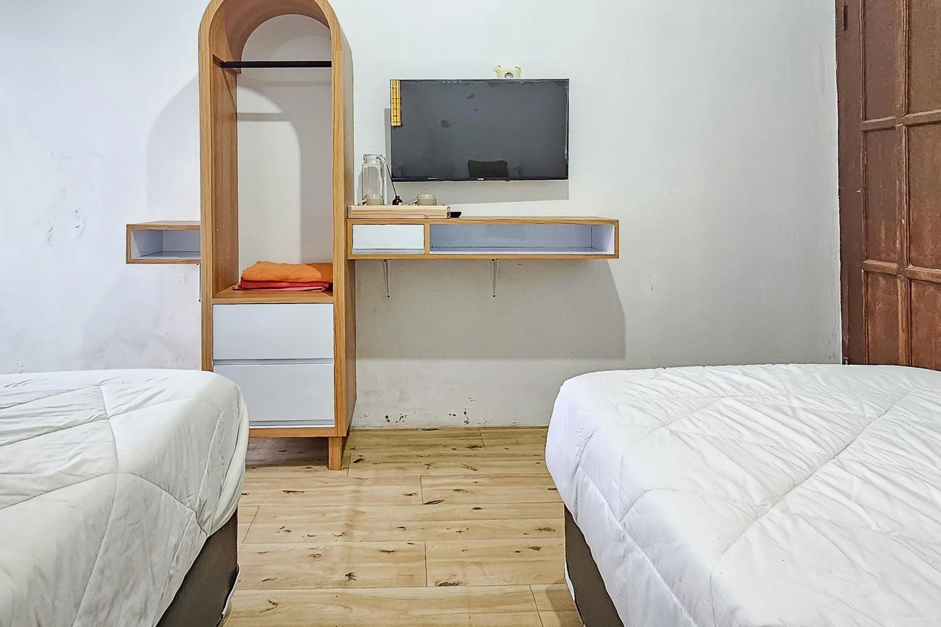 Bedroom, Bed in Urbanview Orchid Guest House