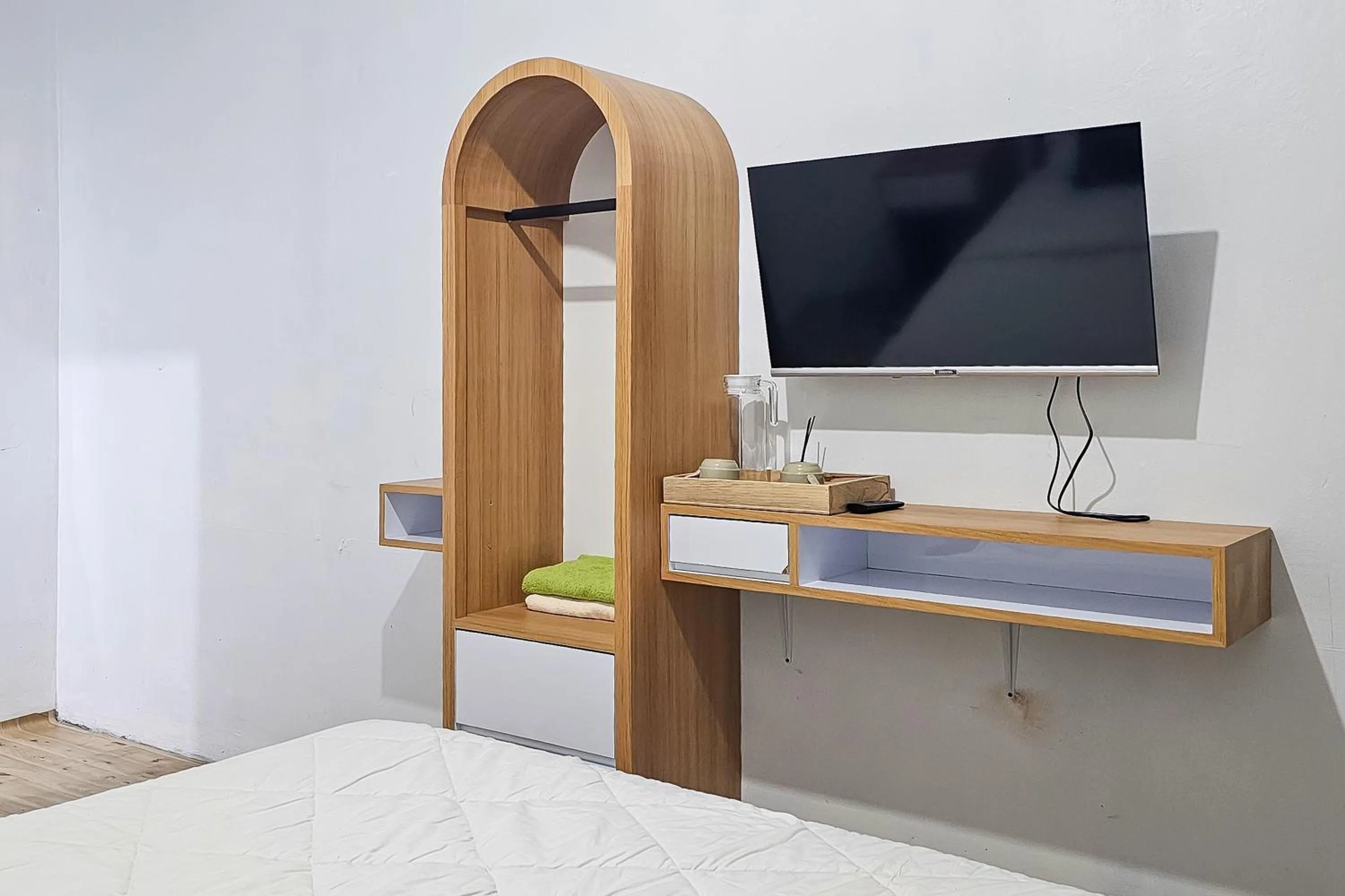 TV and multimedia, Bed in Urbanview Orchid Guest House