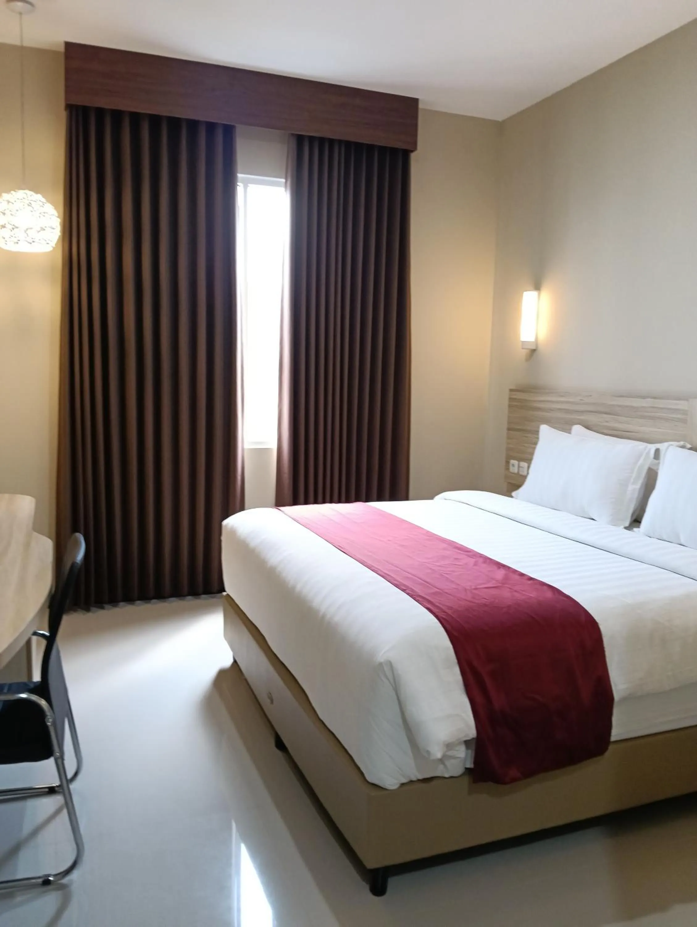 Bedroom, Bed in Sunflower Hotel Syariah near Juanda Airport