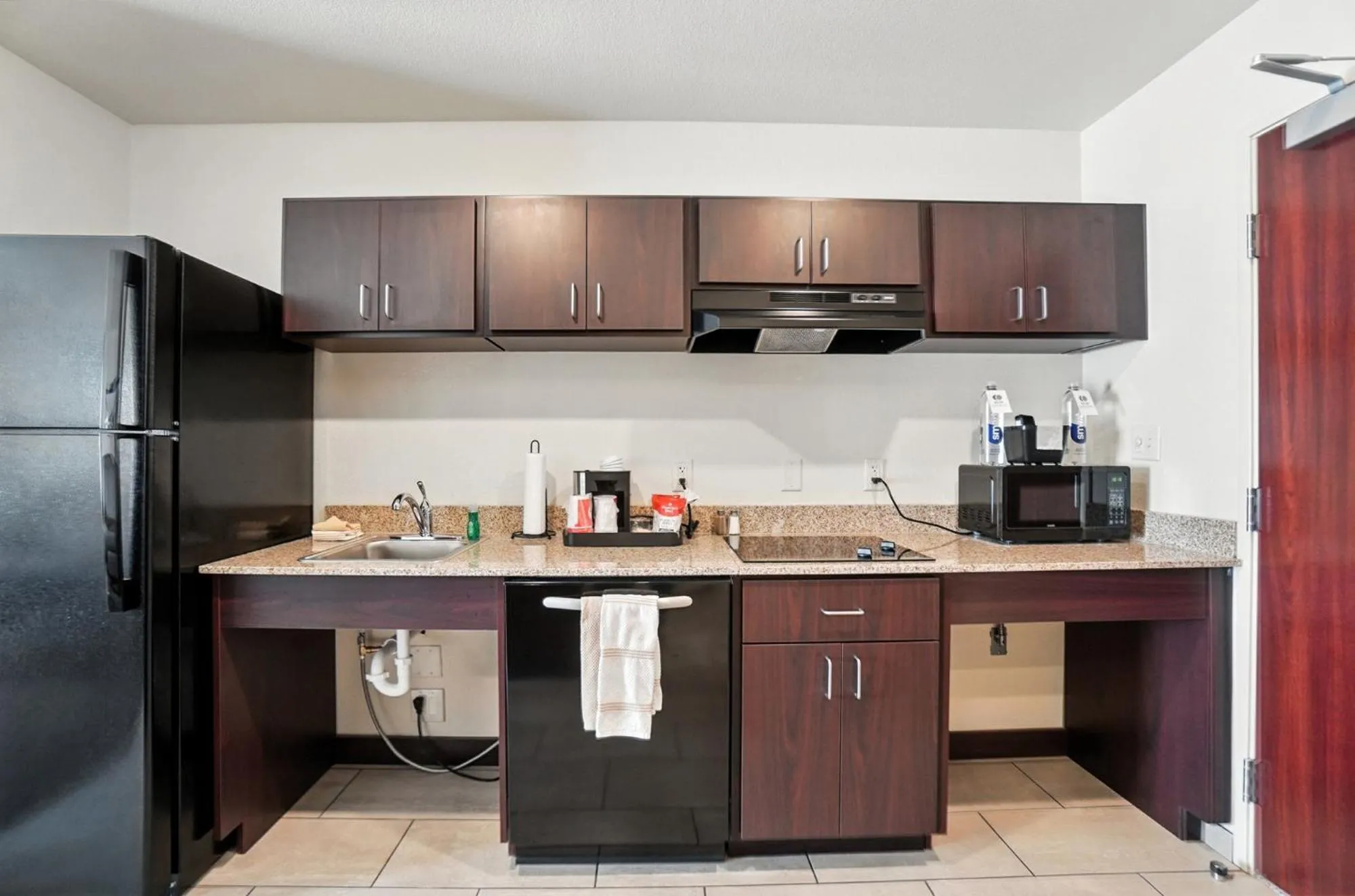 Bedroom in Cobblestone Hotel & Suites - Bellefontaine