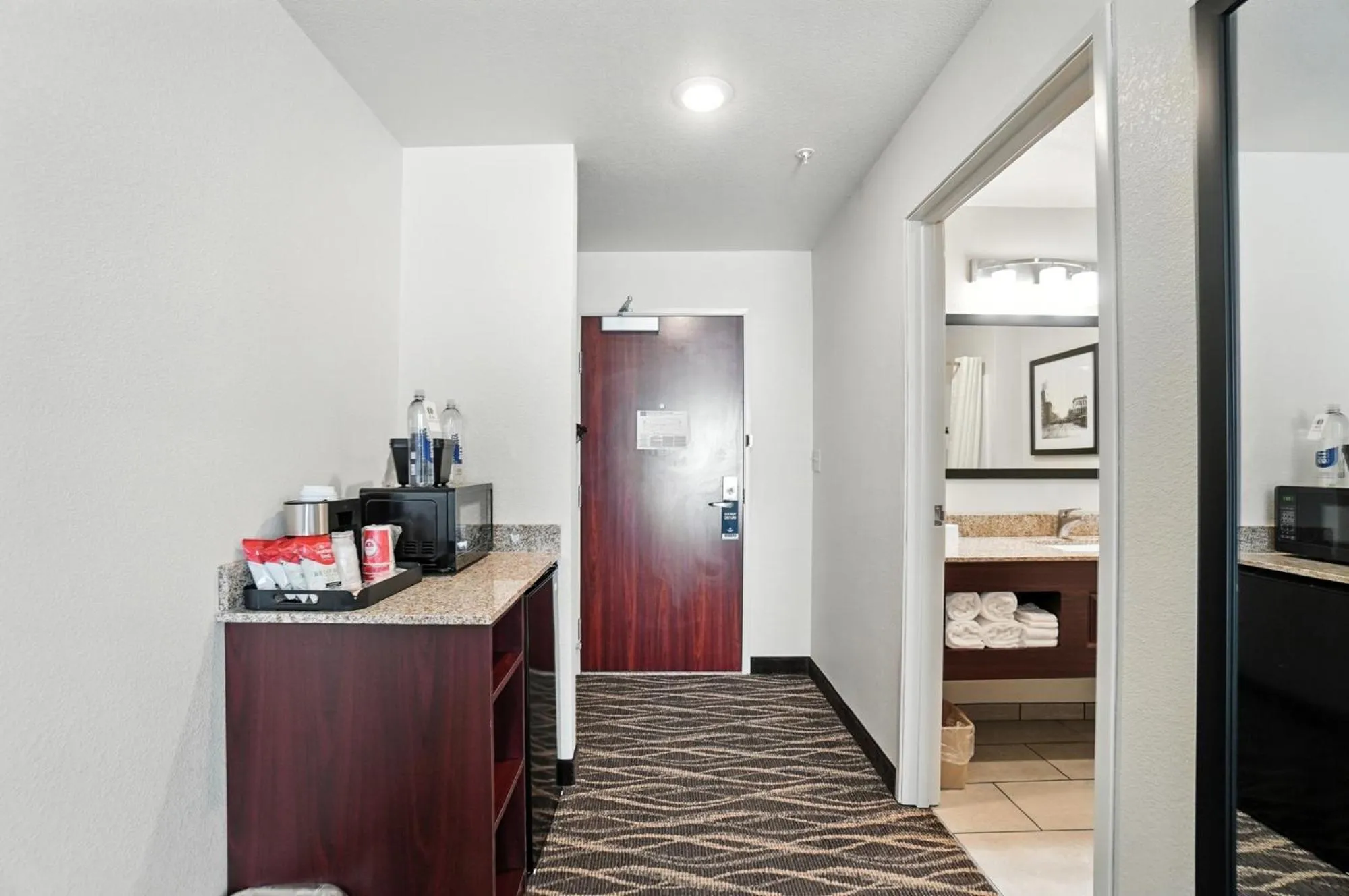 Bedroom in Cobblestone Hotel & Suites - Bellefontaine