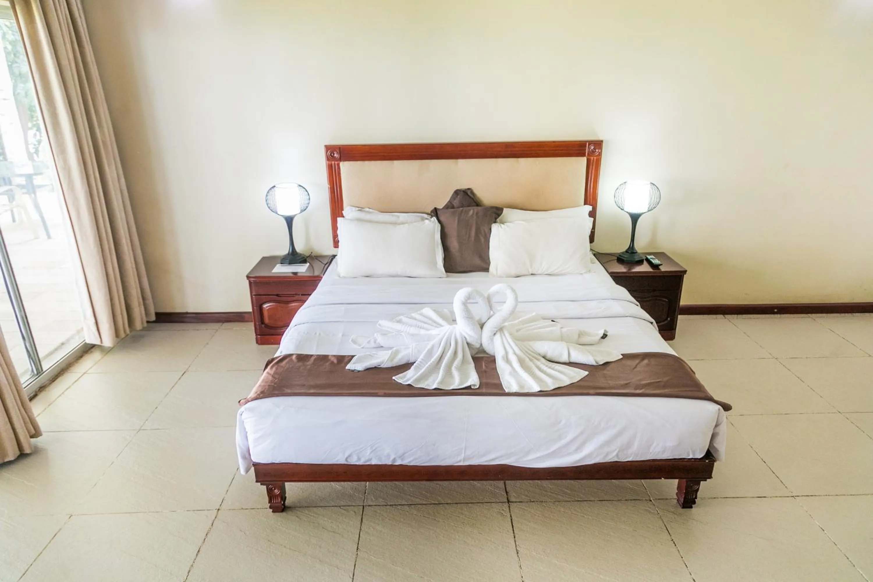 Bed in Lake Safari Lodge