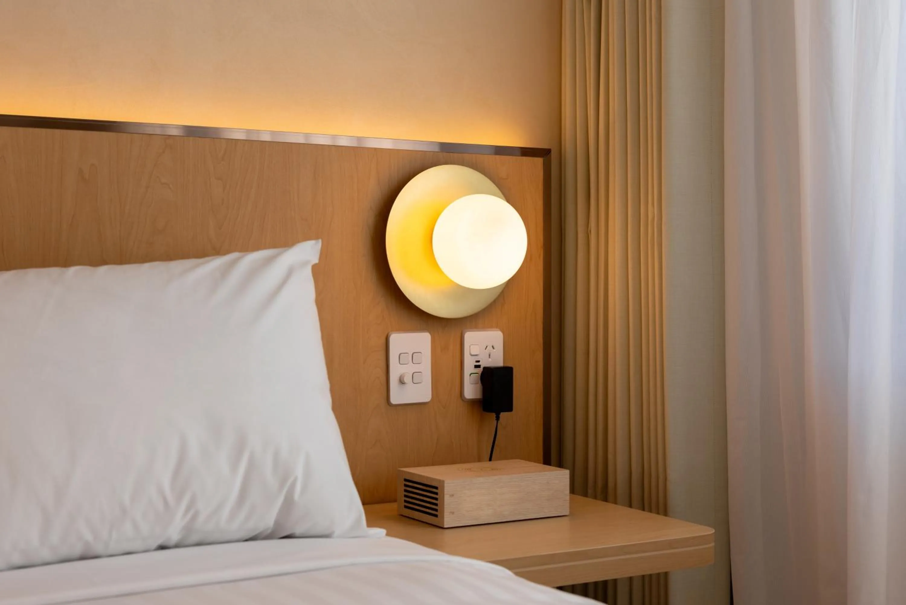 Bed in Maxim Hotel - Auckland