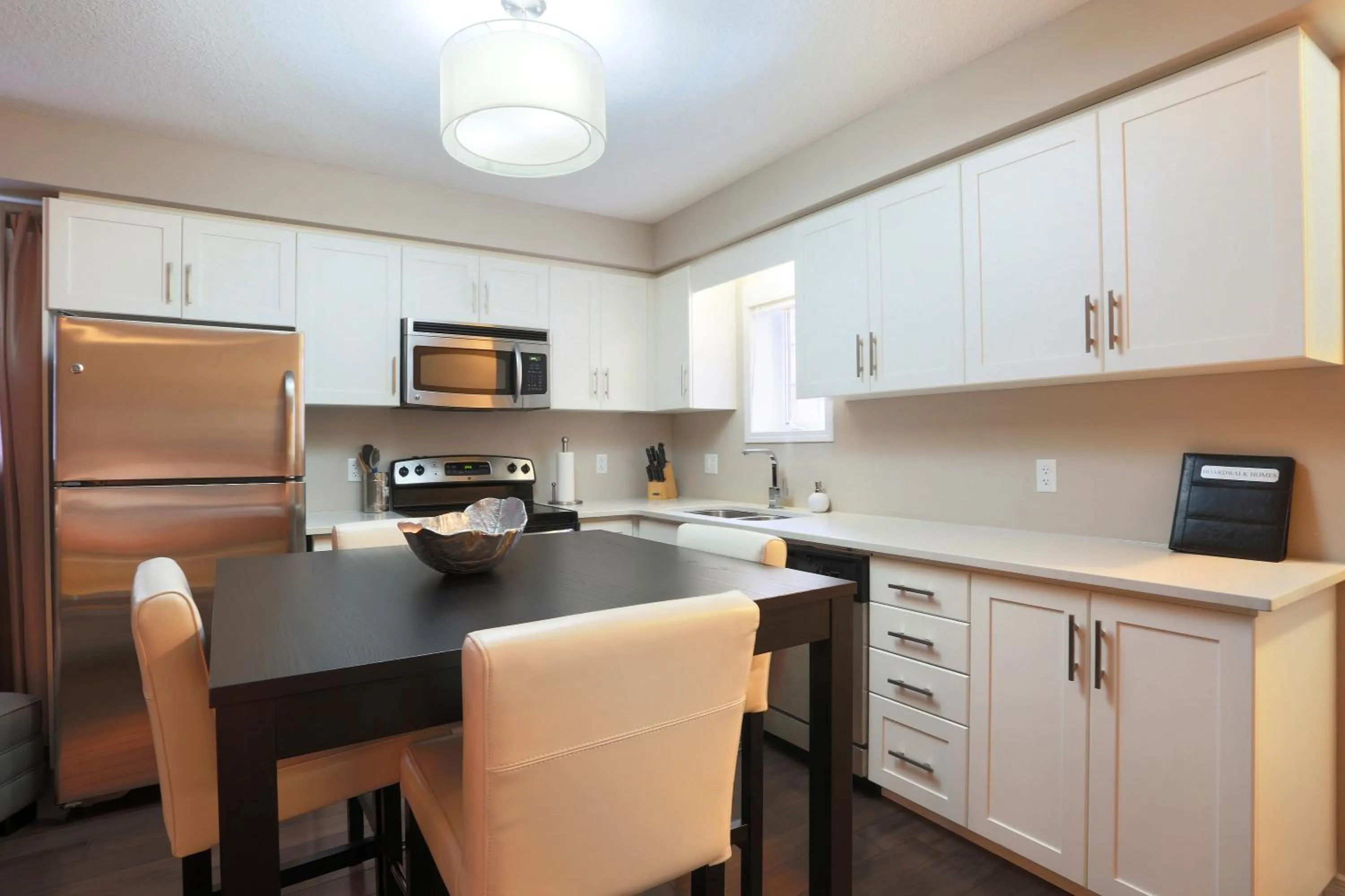 Kitchen or kitchenette in Boardwalk Homes - Executive Townhomes