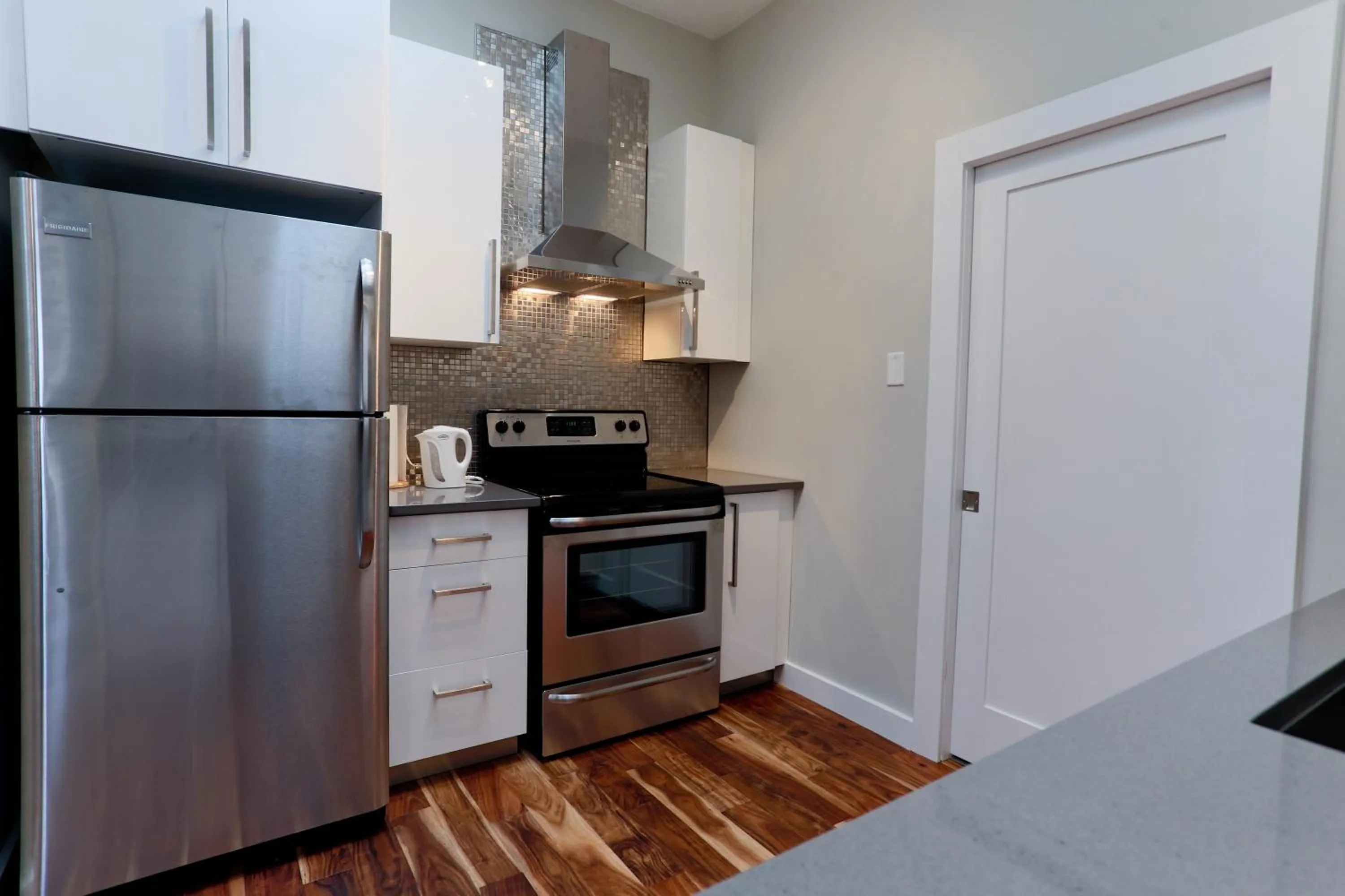 Kitchen or kitchenette in Boardwalk Homes - Executive Townhomes