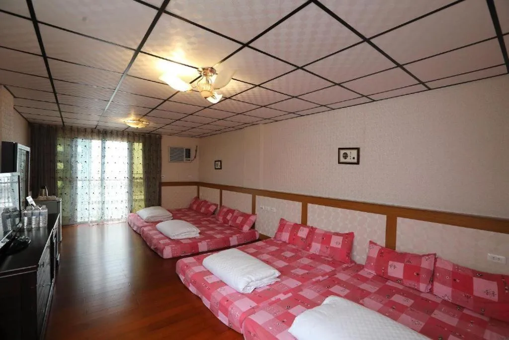 Bed in First Place B&B (Hualien Railway Station)