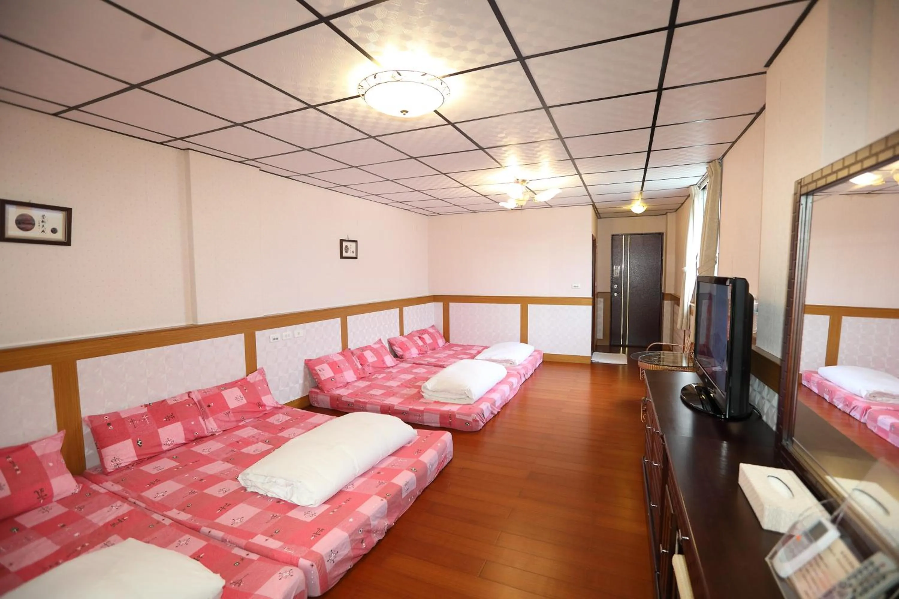 Photo of the whole room, Bed in First Place B&B (Hualien Railway Station)