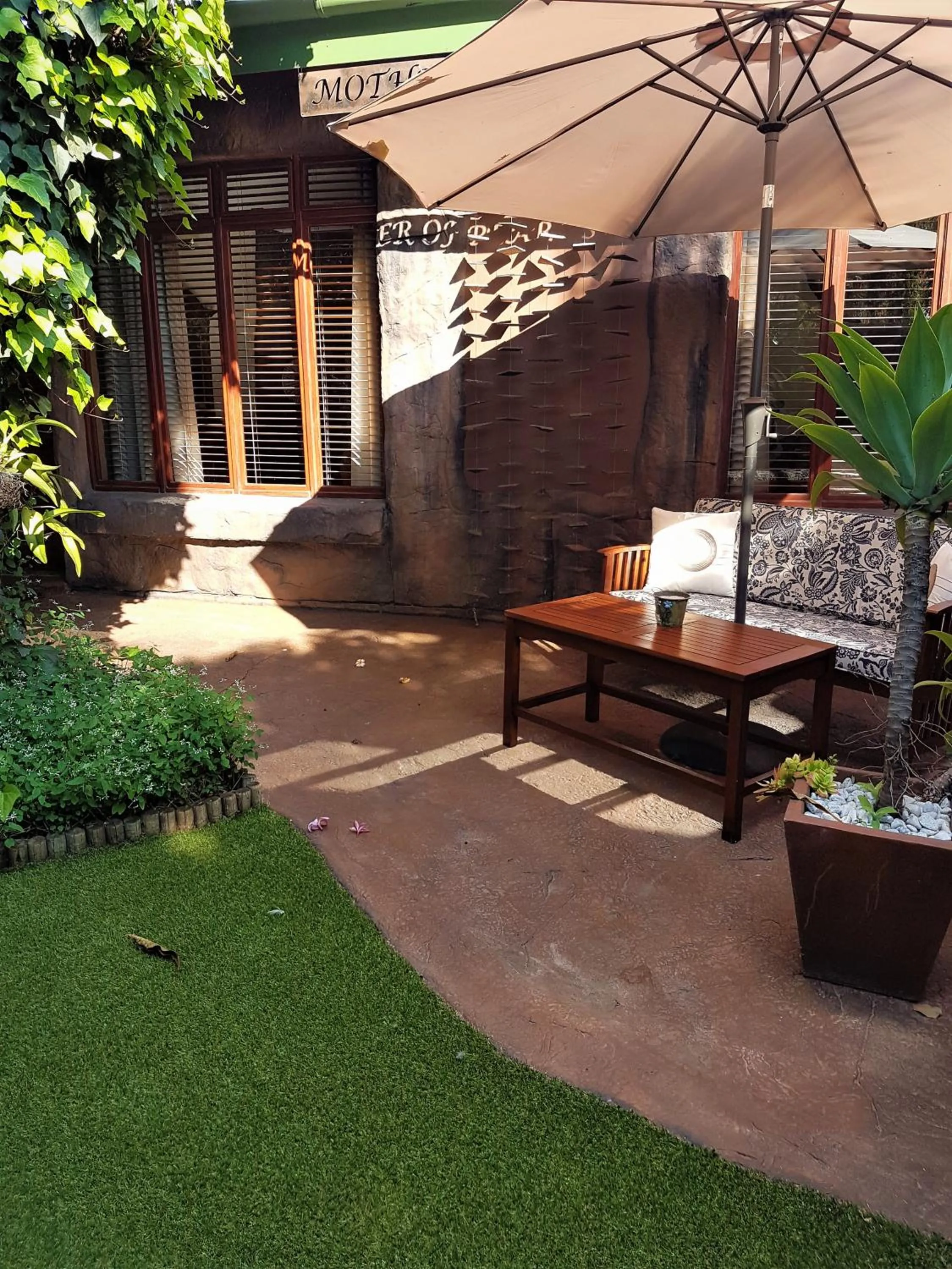 Patio in 61 On Ireland Guest House and Conferencing