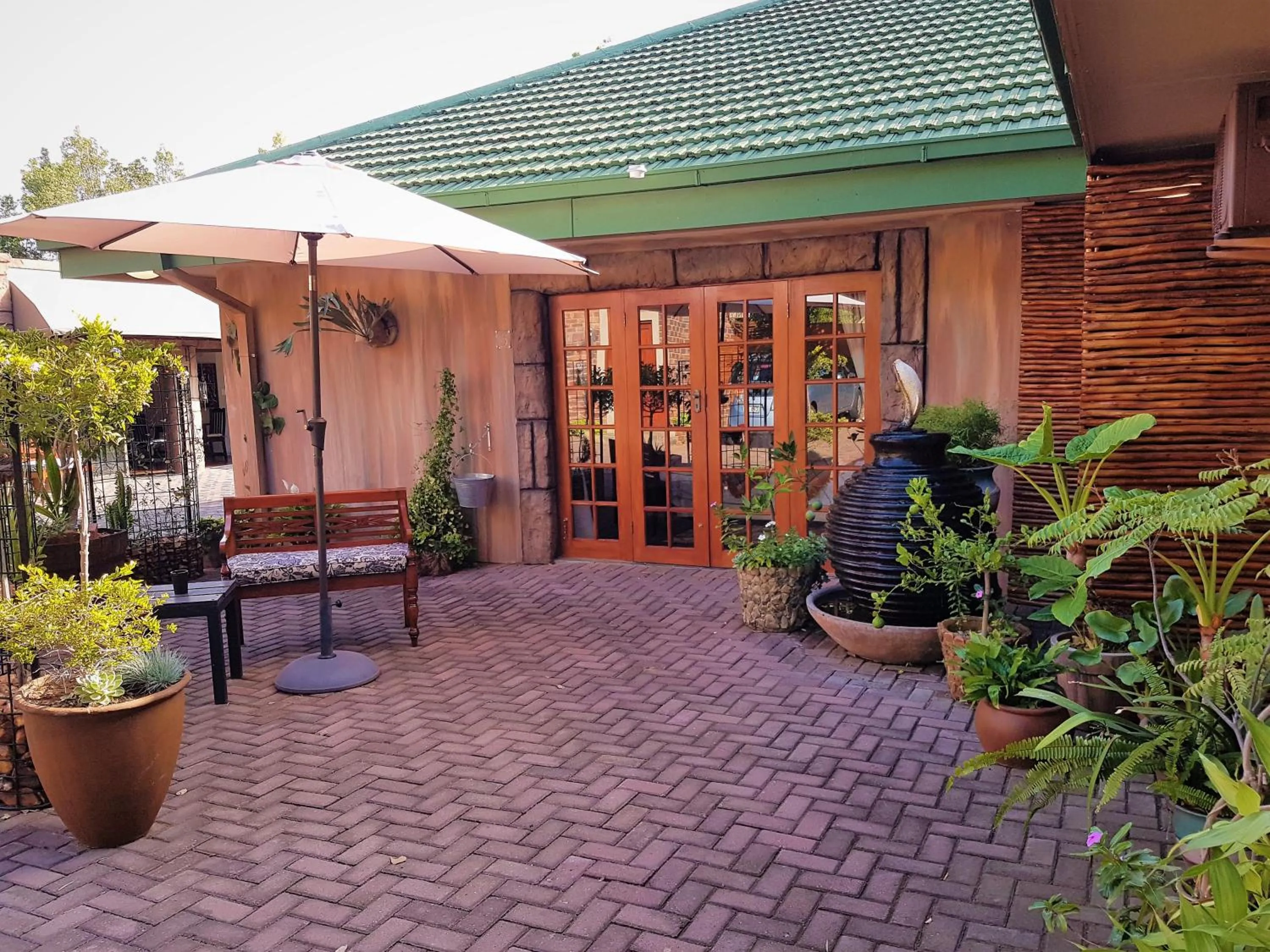 Patio in 61 On Ireland Guest House and Conferencing