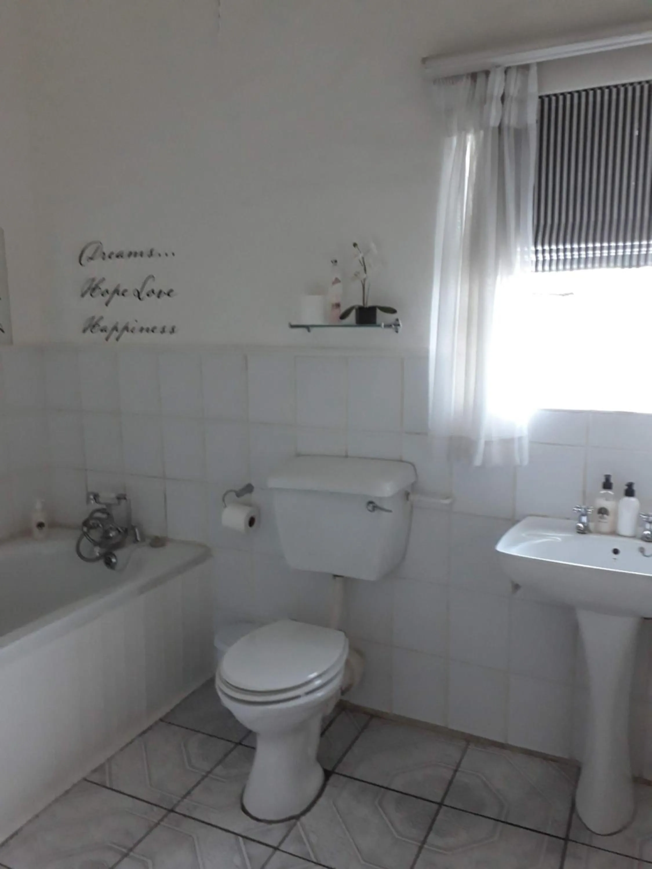 Toilet in The Lighthouse Guesthouse