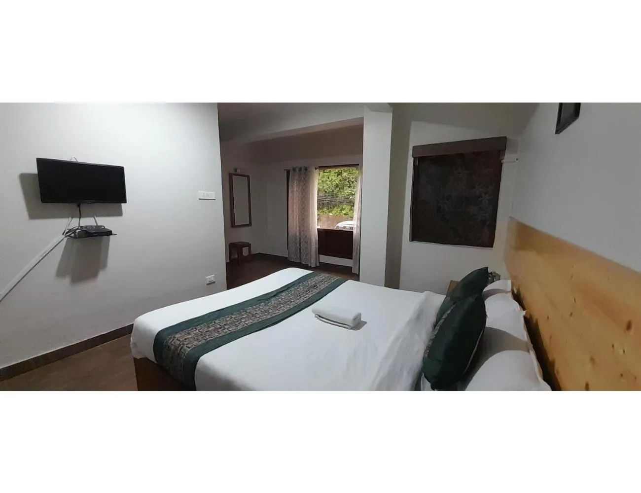 Communal lounge/ TV room in The Hill Castle, Gangtok