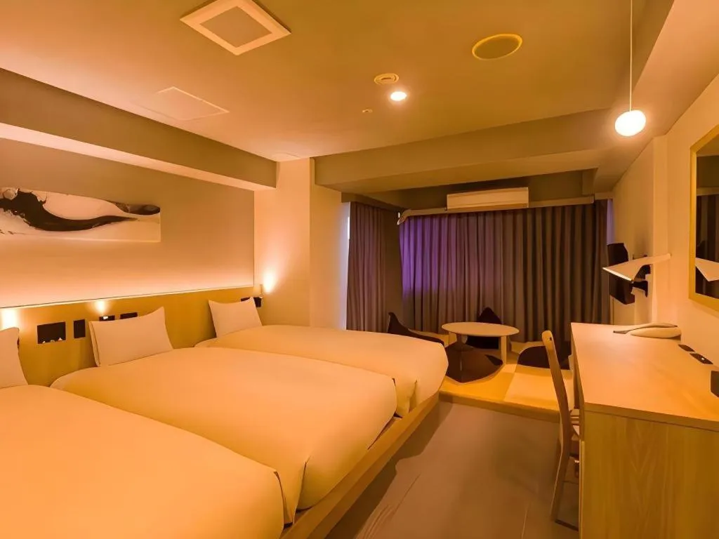 Bed in Ikebukuro Royal Hotel