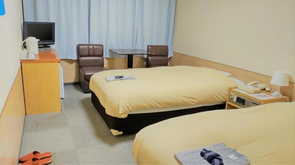 Bed in Ikebukuro Royal Hotel