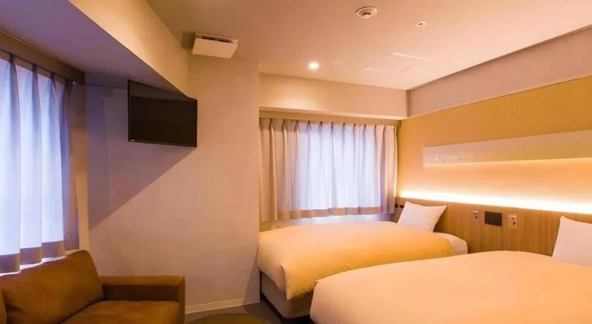 Bed in Ikebukuro Royal Hotel