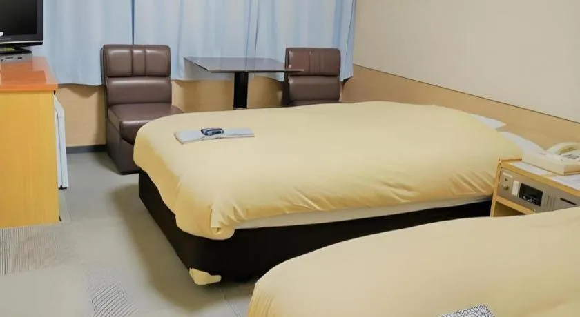 Bed in Ikebukuro Royal Hotel