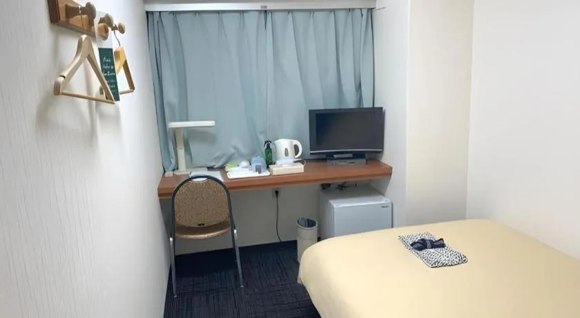 Bed in Ikebukuro Royal Hotel