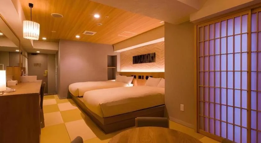 Bed in Ikebukuro Royal Hotel