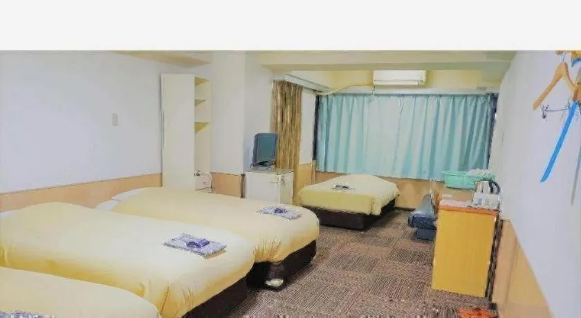 Bed in Ikebukuro Royal Hotel