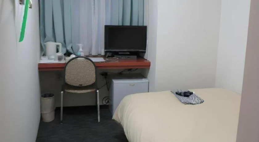 Bed in Ikebukuro Royal Hotel