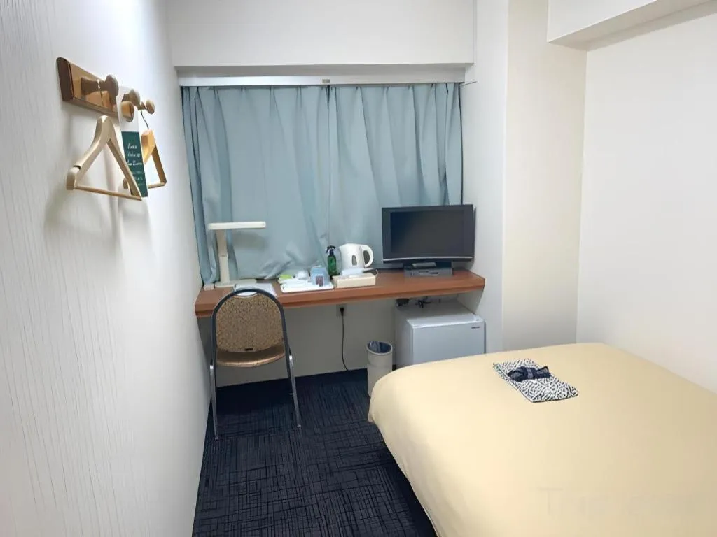 Bed in Ikebukuro Royal Hotel